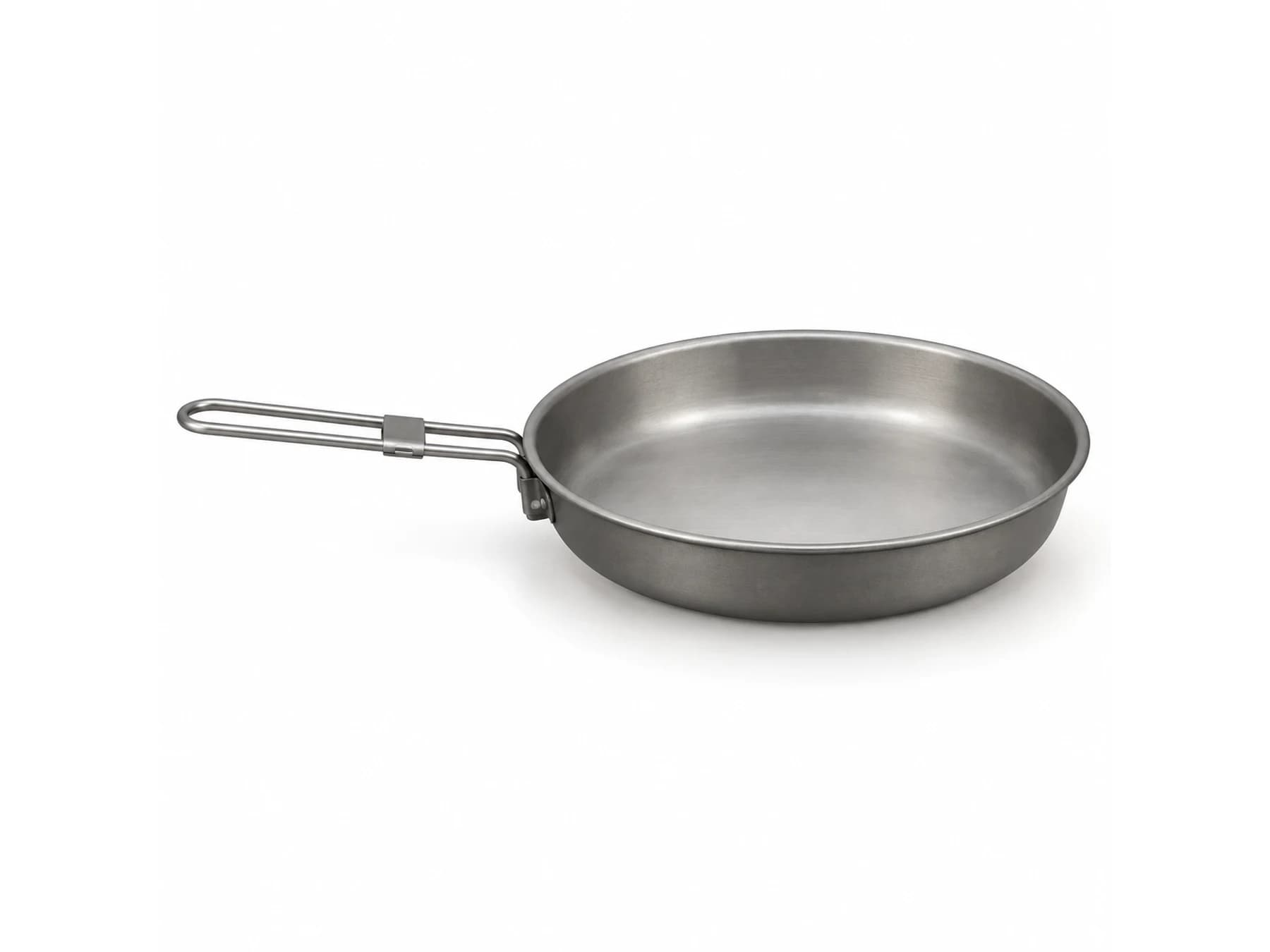 Titanium frying pan and cookware platforms in a controlled studio reference
