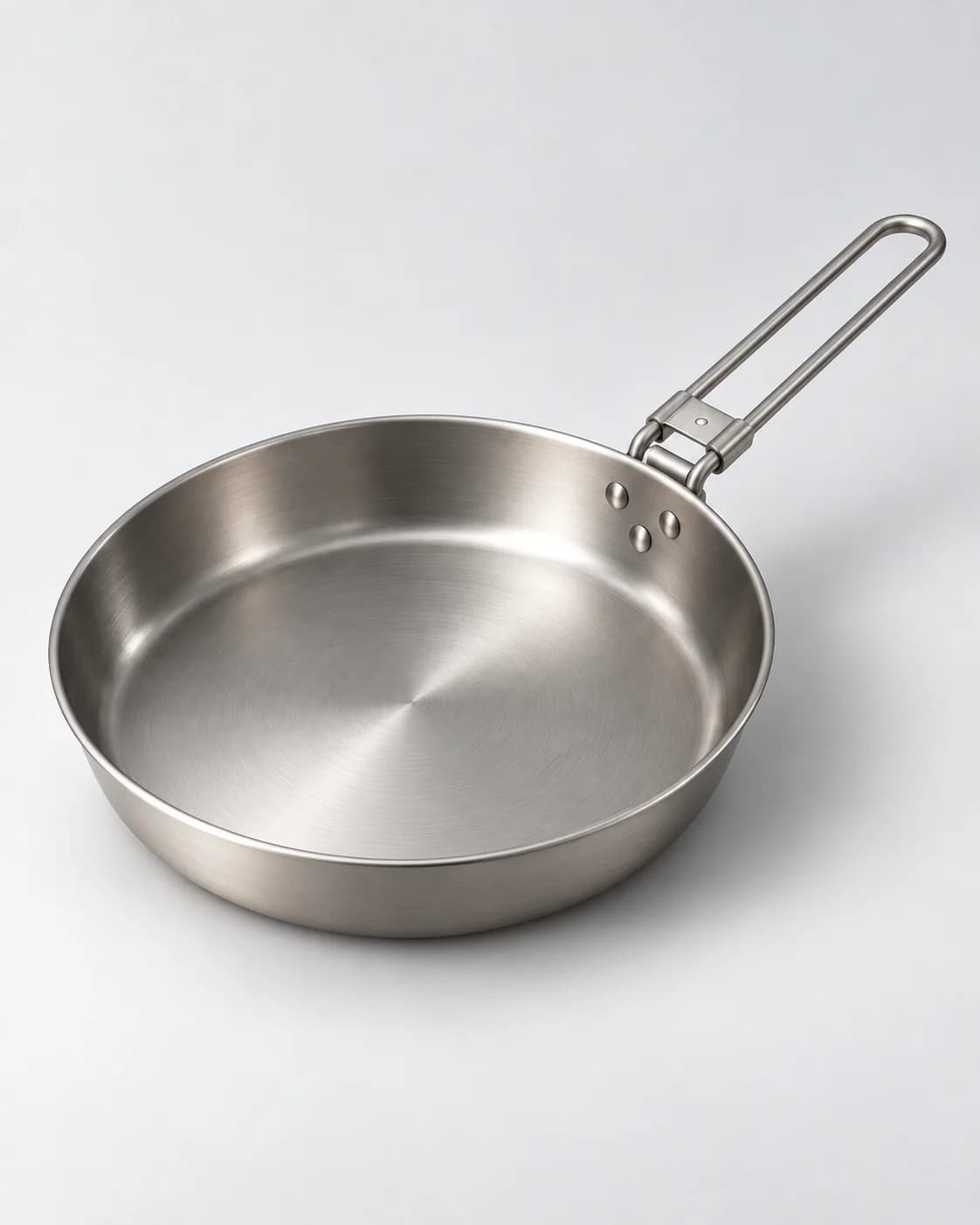AI-generated illustrative visual of a metal frying pan and folding-handle form