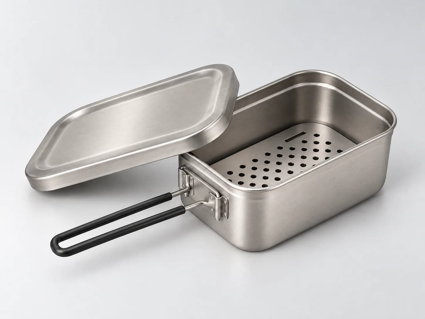 AI-generated illustrative visual of an open metal lunch box with a perforated tray
