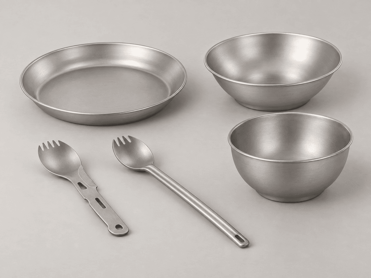 Titanium tableware and kitchen utensil platforms